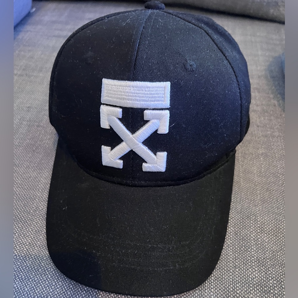 Off-White logo baseball hat. Never worn. Adjustable dad hat style
